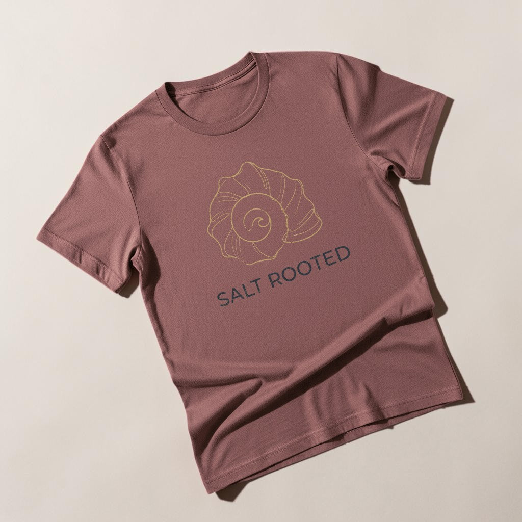 Flat lay - brick mauve Salt Rooted tee on weathered driftwood planks