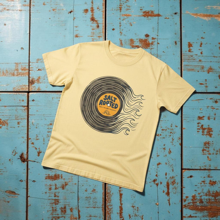 Salt Rooted Vinyl Record Tee in Banana Yellow — front graphic, warm sand studio background