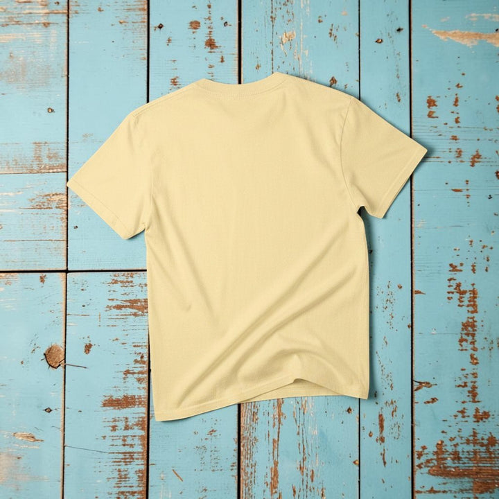 Salt Rooted Vinyl Record Tee in Banana Yellow — plain back, warm sand studio background