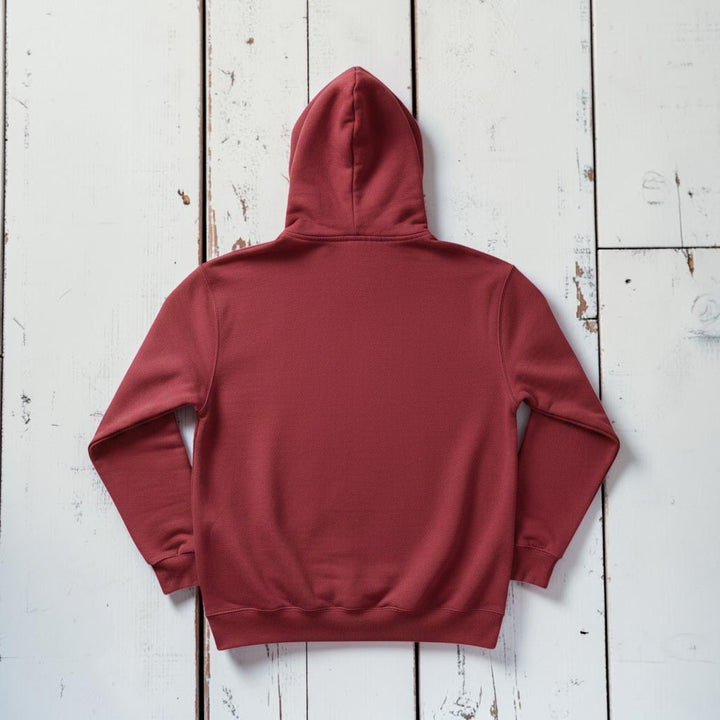 Saltwater Surf Club Hoodie in Crimson — plain back, warm sand studio background