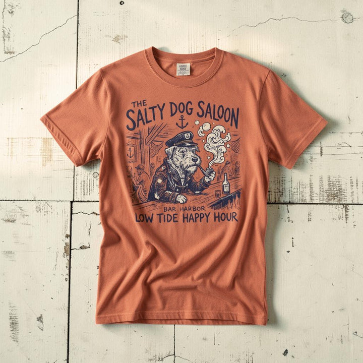 Salty Dog Saloon nautical bar sea captain graphic t-shirt in Terracotta casually tossed on a light sand-colored woven rug