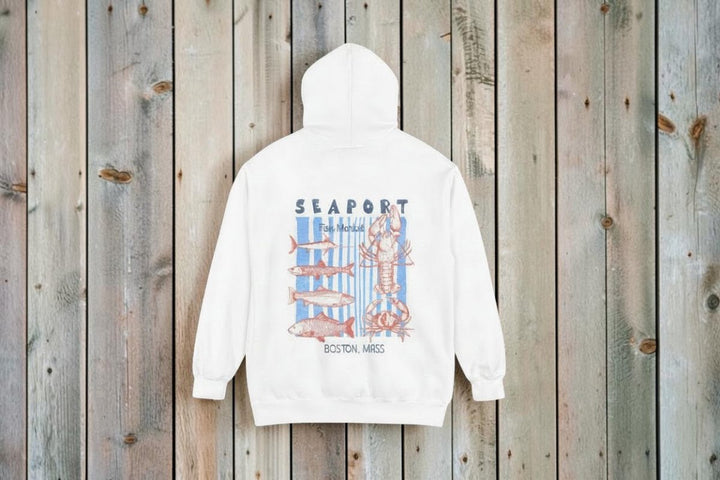 White hoodie with seafood graphic and text on a white background