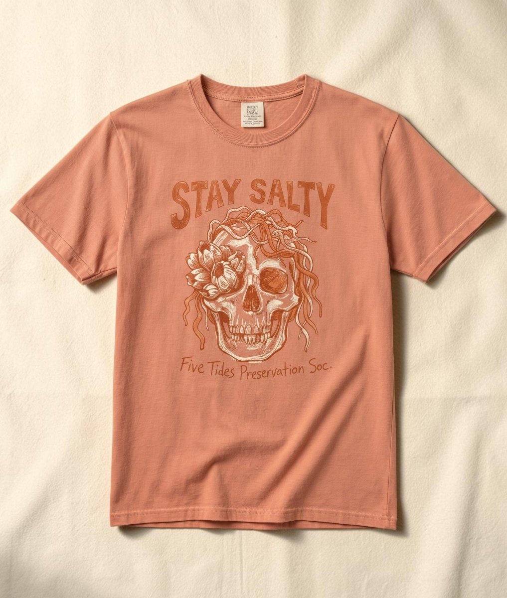 FIVE TIDES APPAREL terracotta garment-dyed cotton t-shirt featuring a coastal skull graphic with rope and sea blooms.