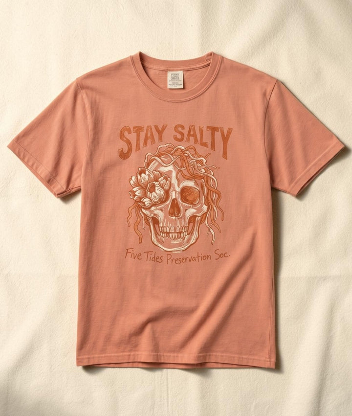 FIVE TIDES APPAREL terracotta garment-dyed cotton t-shirt featuring a coastal skull graphic with rope and sea blooms.