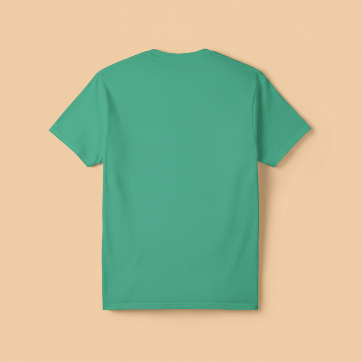 Surf Club Tee in Island Green — plain back, warm sand studio background