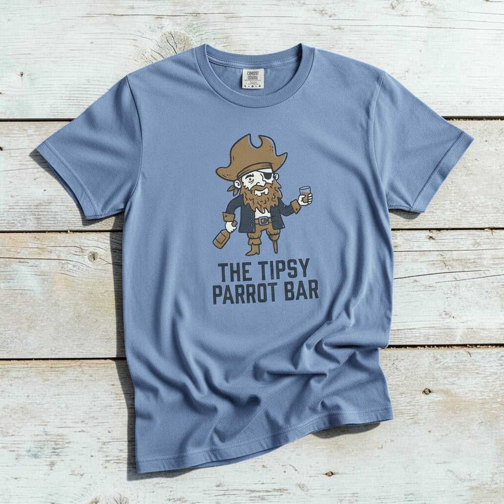 Tipsy Parrot Bar washed denim garment-dyed tee casually tousled on rustic reclaimed wood