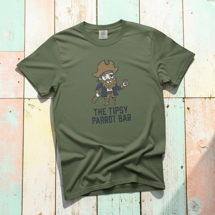Tipsy Parrot Bar sage garment-dyed tee casually tousled on rustic reclaimed wood