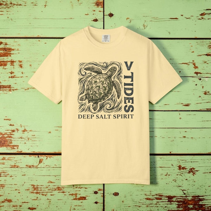 Yellow t-shirt with a turtle graphic and text on a white background