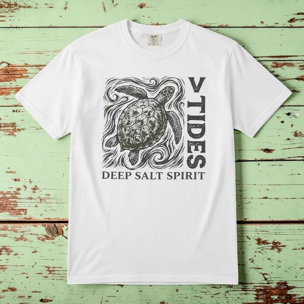 Flat lay - white V Tides Deep Salt Spirit tee on weathered driftwood planks