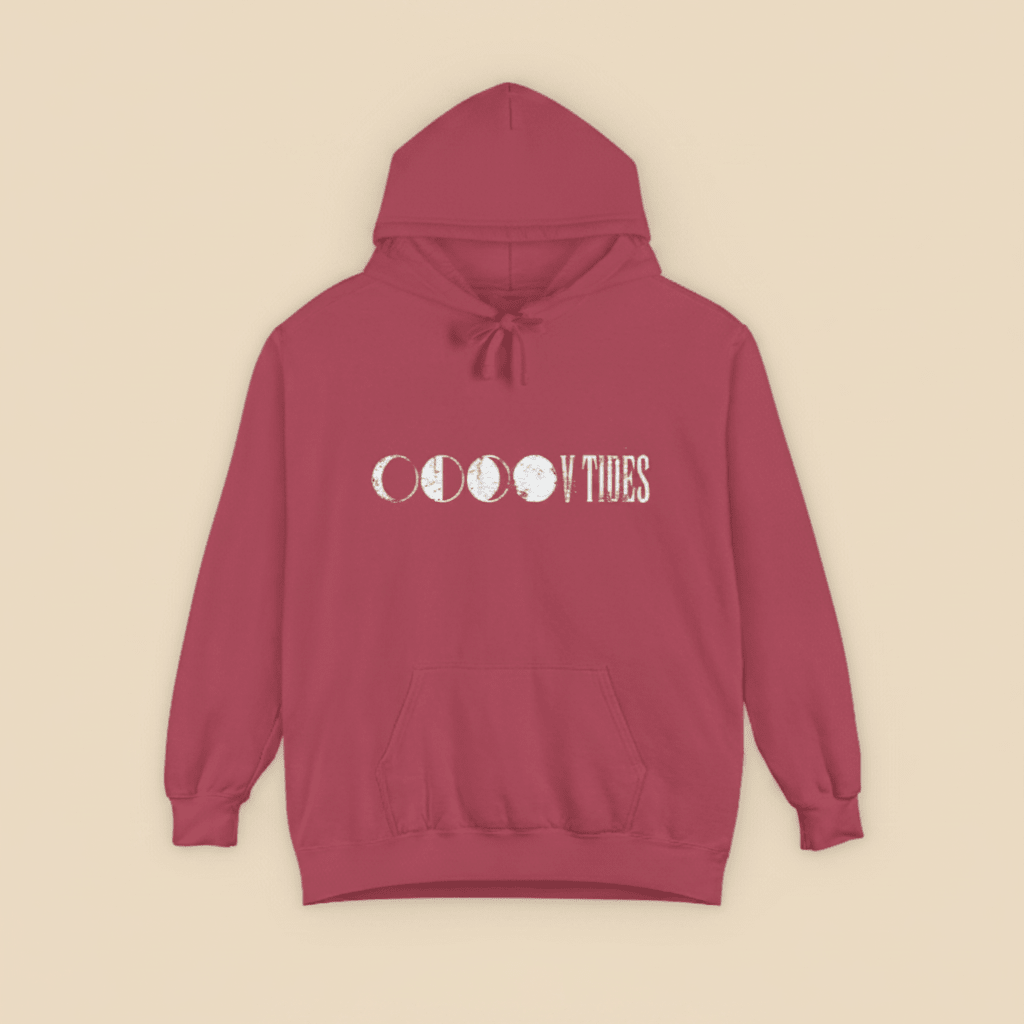 Crimson V Tides Moon Phases hoodie on sandy beige background — mobile product shot