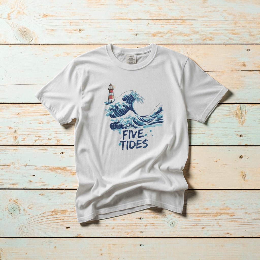 Wave &amp; Lighthouse white garment-dyed tee casually tousled on rustic reclaimed wood