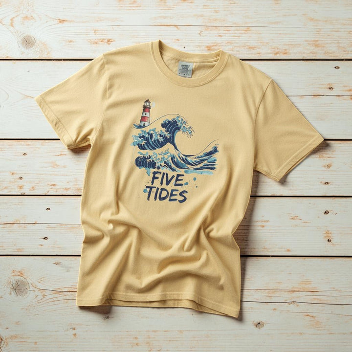 Wave &amp; Lighthouse banana garment-dyed tee casually tousled on rustic reclaimed wood